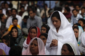Pakistani Christian Women gather to pray in Lahore... site of church that was attacked...
